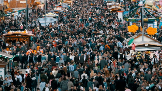 Top-view-of-crowd-on-central-street-in-Oktoberfest.-Bavaria,-Germany.-Slow-Motion