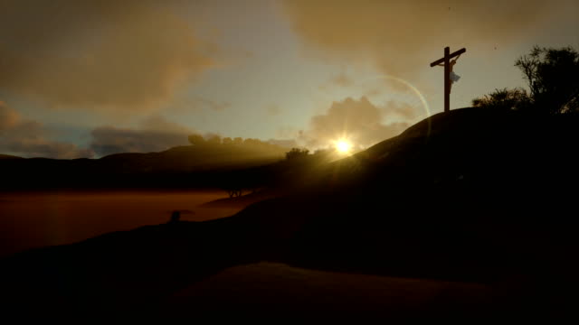 Christian-woman-praying-at-Jesus-cross,-sunrise,-4K