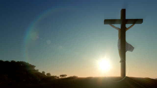Jesus-cross-at-sunrise,-zoom-out