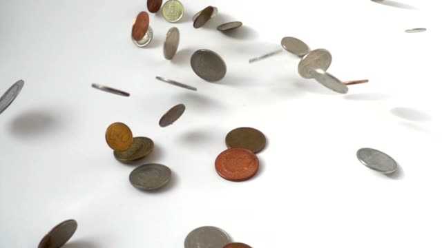 Coins-in-falling.-Slow-Motion.