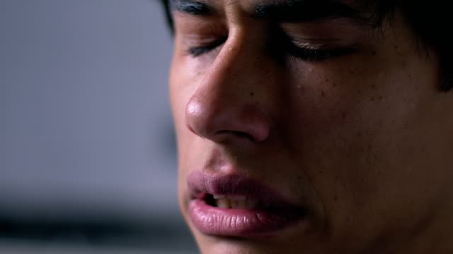 Depression,-sadness.-Upset-Young-man-crying--close-up