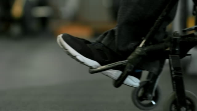 Unrecognizable-Paraplegic-Person-on-Wheelchair