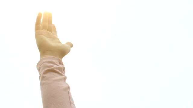 Woman-raises-hand-up-providing-God-light,-religious-female-feels-holy-spirit