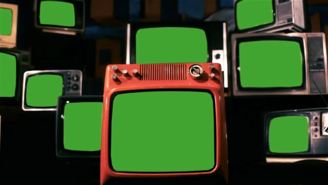 Many-Old-Tvs-With-Green-Screen.-Blue-Steel-Tone.