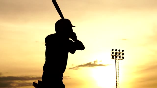 Silhouette-baseball-player-holding-a-baseball-bat-to-hit-the-ball-drills