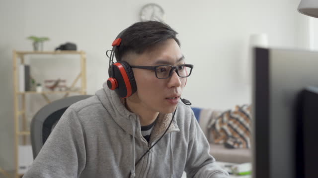 man-in-headset-playing-game-talk-with-partner