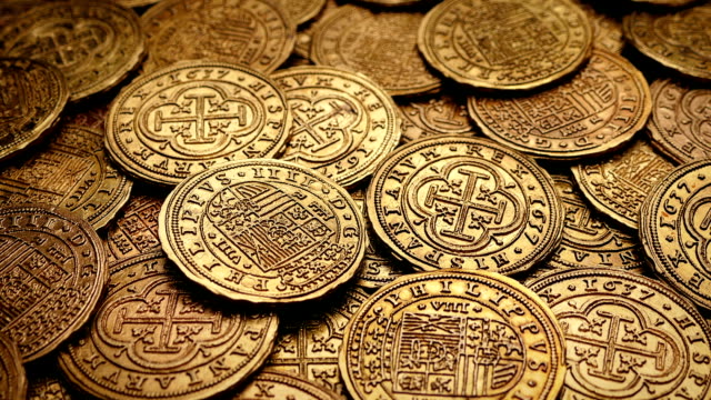 Passing-Gold-Coins-Treasure-Pile