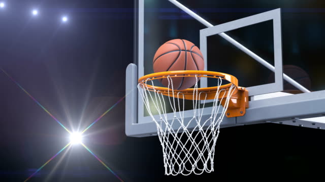 Schönen-Basketball-Ball-trifft-Korb-Netto-Zeitlupe-Nahaufnahme-Foto-Blitze.-Ball-fliegt-Spinning-in-Basketballkorb-mit-Stadion-Leuchten.-Sport-Konzept-3d-Animation