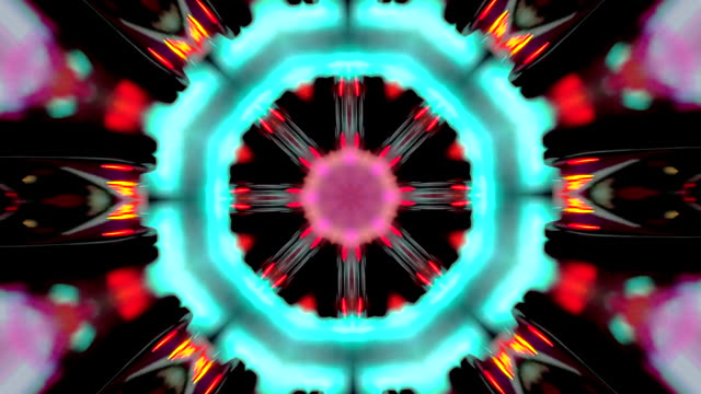 video-en-forma-de-un-caleidoscopio-de-mandala-forman-rotando-y-cambiando-que-se-abren-en-flores-y-formas-geométricas-con-movimiento-en-colores-y-en-fondo-negro
