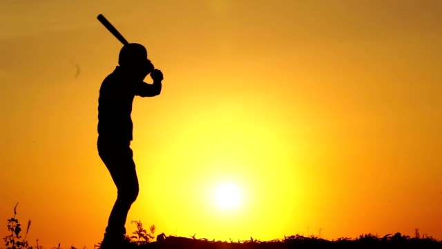 Silhouette-man-with-baseball-bat-to-practice