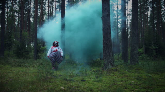 4K-Halloween-Horror-Clown-in-Forest-Walks-in-Smoke
