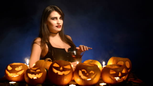 Woman-with-Halloween-pumpkins