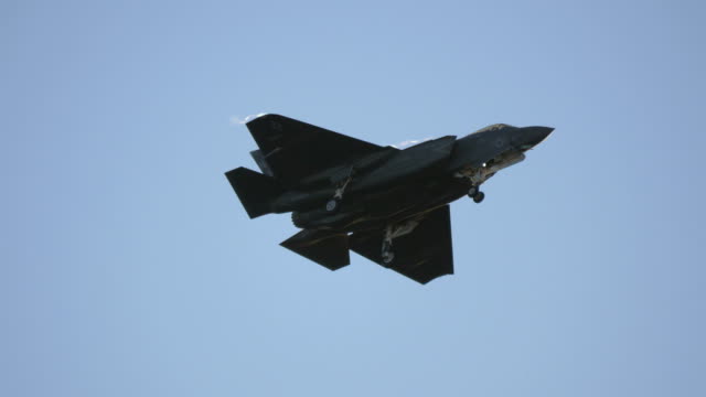 US-Navy-fighter-jet-in-flight-in-4k