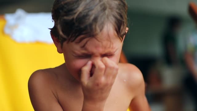 Child-crying-and-sobbing-uncontrollably-in-120fps-slow-motion.-Candid-authentic-clip-of-young-boy-weeping-with-sad-unhappy-expression