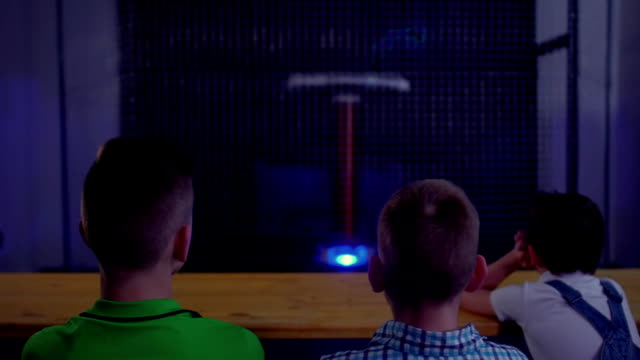 Teenagers-watches-musical-show-with-dancing-lightning-of-tesla-coil