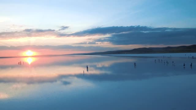 Salt-Lake-and-sunset-human-silhouette