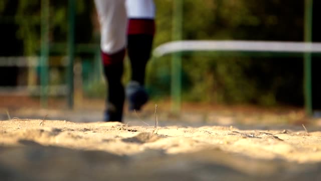 Baseball-player-slides-into-home-base