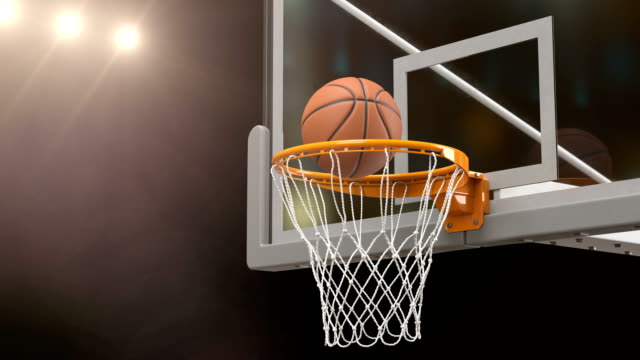 Schönen-Basketball-Ball-trifft-Korb-Netto-Zeitlupe-Nahaufnahme-Kamera-fliegen.-Ball-fliegt-Spinning-in-Basketball-Hoop-Gold-Stadion-Strahler.-Sport-Konzept-3d-Animation