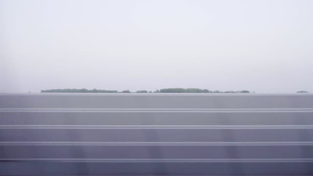Passing-Landscape-Asian-Bullet-Train-High-Speed-Transportation-Travel-Greenery