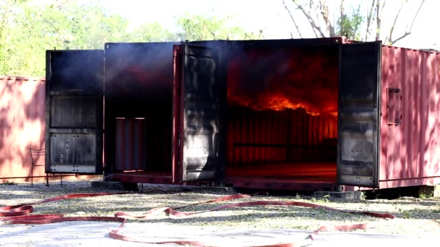 Fire-and-rescue-training-school-regularly-to-get-ready.-Storage-container-on-fire
