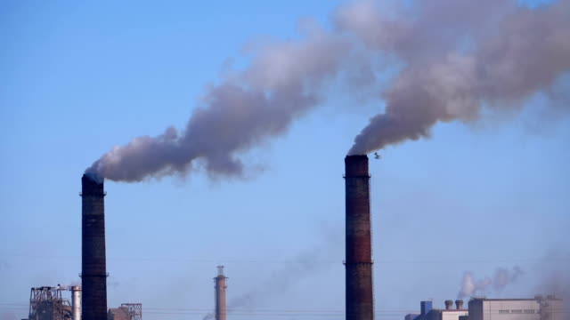 Smoke-from-the-Chimneys-of-Industrial-Metallurgical-Plant-Rises-in-the-Atmosphere-near-the-City