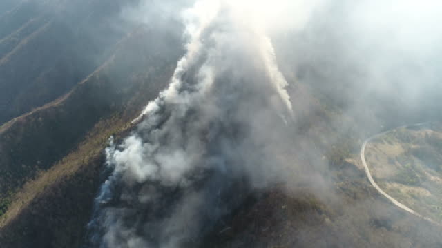 Footage-of-a-mountain-covered-in-thick-smoke...
