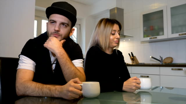 Unhappy-upset-couple-having-morning-coffee-not-talking-to-each-other-after-a-fight
