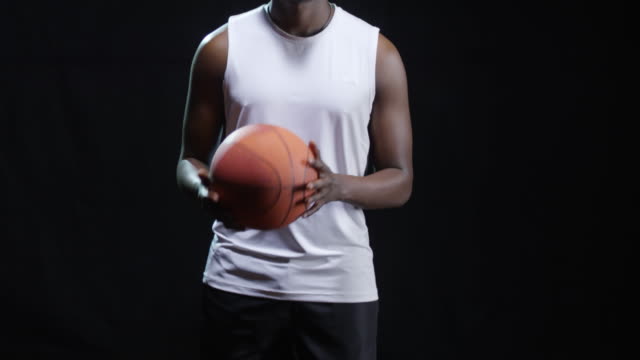 Confident-Basketball-Player-Throwing-Ball