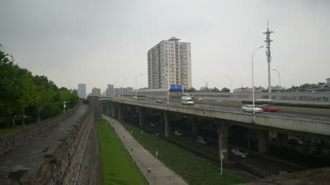 rainy-day-wuhan-city-traffic-street-road-junction-panorama-4k-china