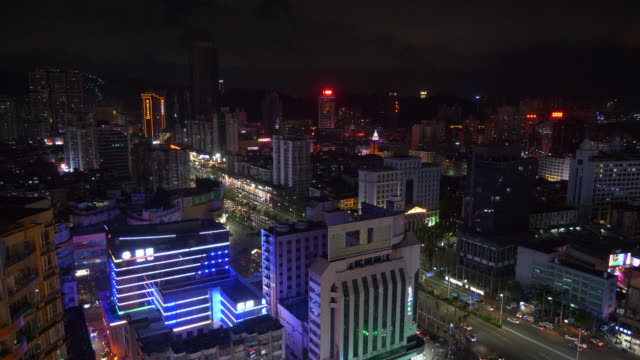 Zhuhai-paisaje-iluminada-de-la-noche-en-la-azotea-panorama-4k-china