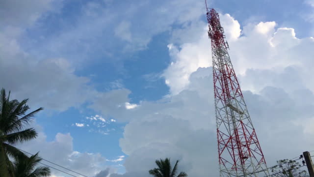 Time-lapse-blue-sky-and-cloudy-with-antenna-telephone-communication.-4k-resolution.