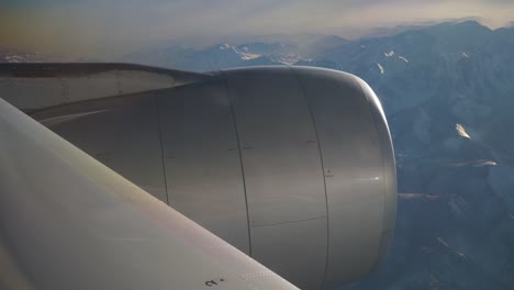 sun-light-airplane-engine-mountains-window-view-4k-china