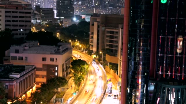 Zeit-Ablauf-beschäftigt-Hong-Kong-City-bei-Nacht-mit-Beleuchtung-von-Aufzügen-und-Verkehr
