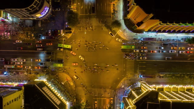 night-illuminated-sanya-bay-traffic-street-crossroad-aerial-timelapse-4k-china
