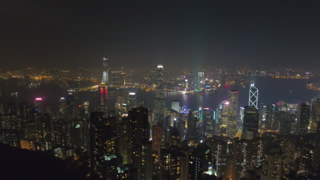 china-famous-night-illuminated-hong-kong-city-bay-aerial-panorama-4k