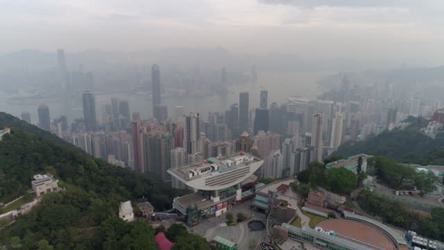 China-bewölkten-Sonnenuntergang-Hongkong-berühmte-Gipfel-Turm-Bucht-Luftbild-Panorama-4k