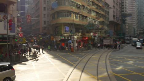 hong-kong-day-time-tram-traffic-street-center-road-trip-crowded-crosswalk-panorama-4k-china