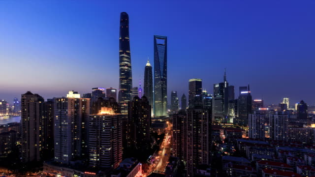 Día-al-lapso-de-tiempo-de-la-noche-de-Shanghai-y-paisaje-urbano