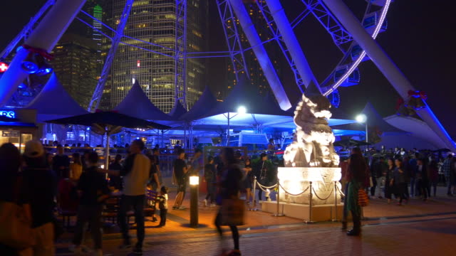 China-Nacht-Beleuchtung-Hong-Kong-Stadt-berühmten-Riesenrad-voll-Panorama-4k