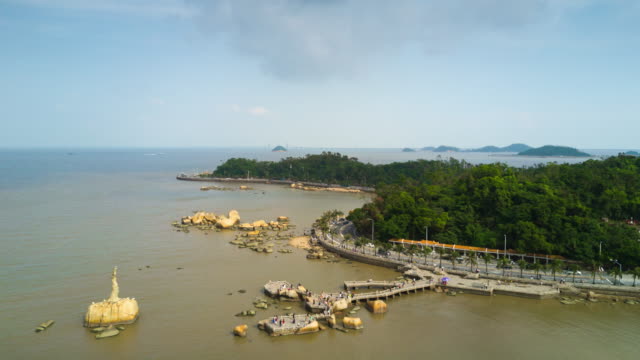 china-sunny-day-zhuhai-city-famous-fisher-girl-monument-bay-aerial-panorama-4k-time-lapse
