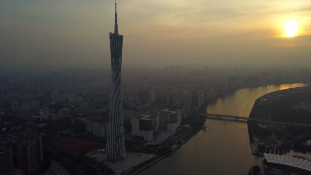 China-cielo-atardecer-guangzhou-ciudad-Cantón-río-famoso-Torre-aérea-panorama-4k