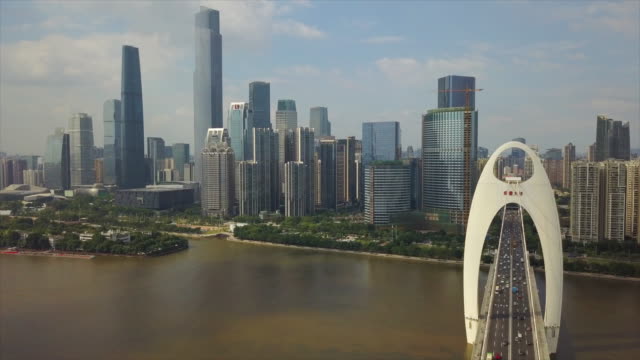 día-tiempo-guangzhou-ciudad-tráfico-liede-Puente-Río-Perla-china-de-panorama-aéreo-centro-4k