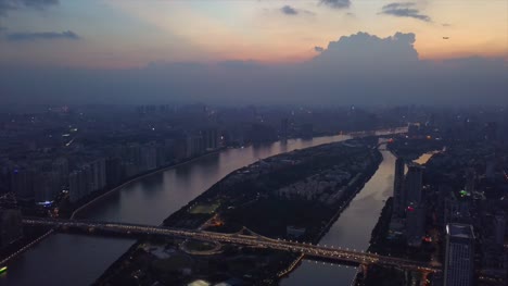 Guangzhou-Sonnenuntergangszeit-Perlfluss-Haixinsha-Insel-Innenstadt-Teil-Luftbild-Panorama-4k-china