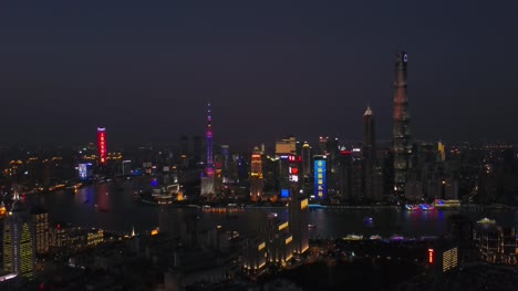 China-tiempo-de-noche-iluminado-shanghai-pudong-céntrico-famoso-panorama-aéreo-4k