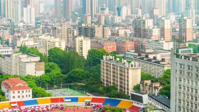 sunny-day-wuhan-cityscape-stadium-market-rooftop-panorama-4k-time-lapse-china