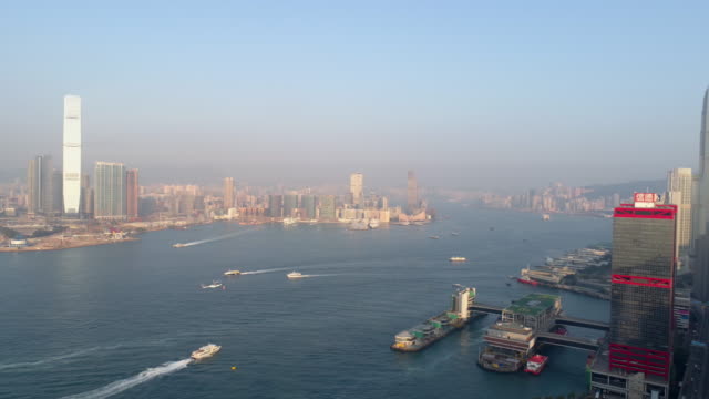 Sonnenuntergang-Licht-Hong-Kong-Stadt-Victoria-Hafen-Verkehr-aerial-Panorama-4k-china