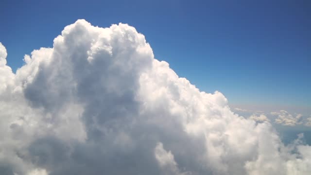 Flying-with-clouds,-watching-clouds-from-airplane-window