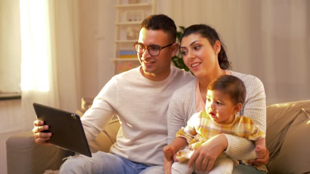 family-with-tablet-pc-having-video-call-at-home
