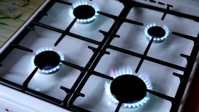 Turns-on-gas-stove-burners