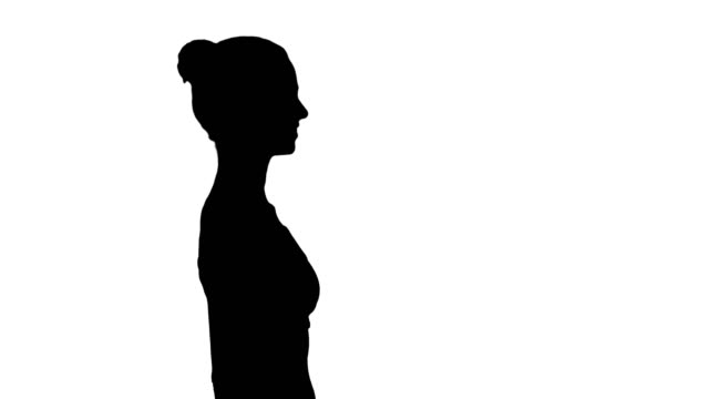 Silhouette-Attractive-woman-in-sport-ware-walking-smiling